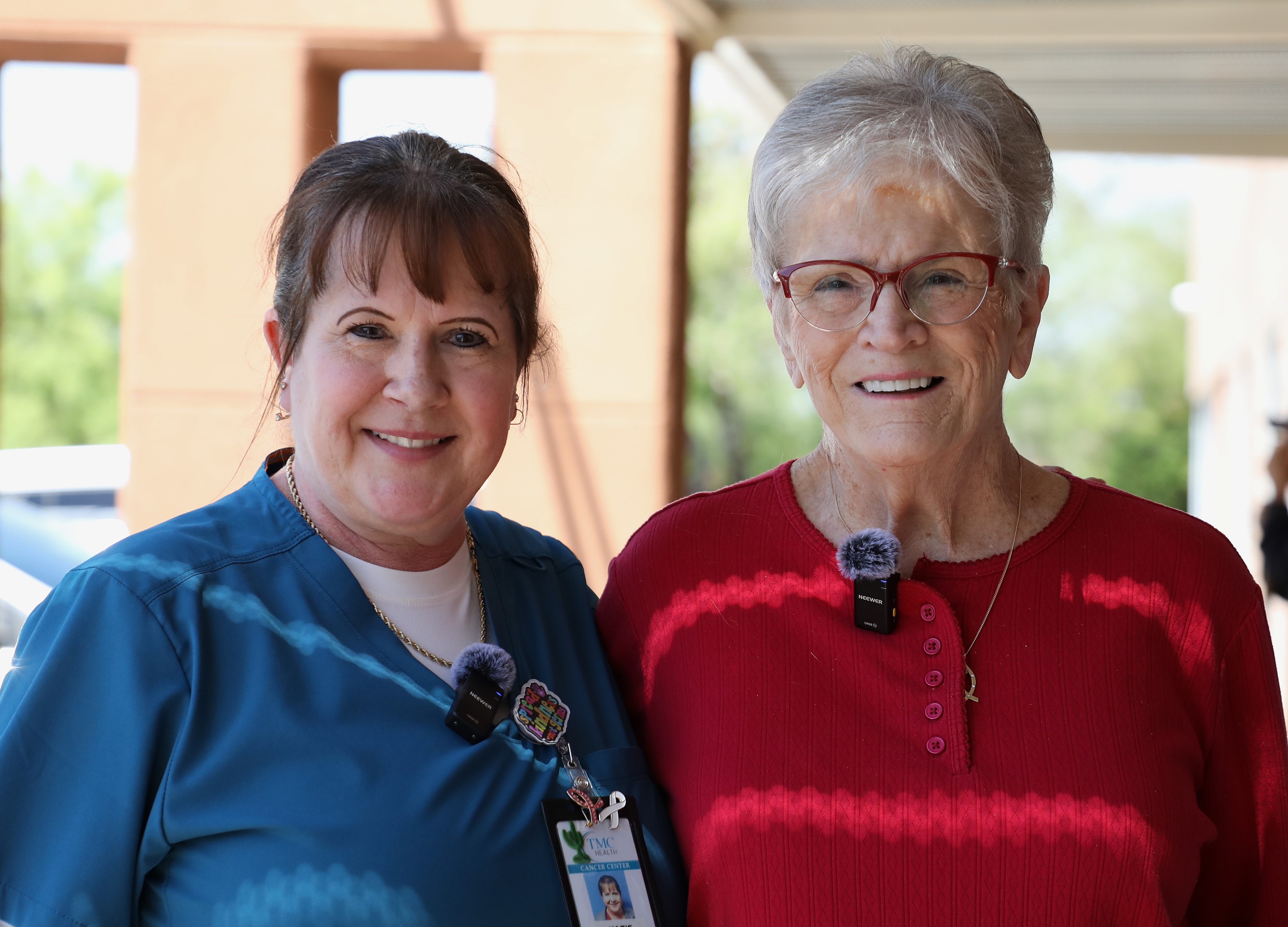 RN Katie with patient Dottie smile into camera 