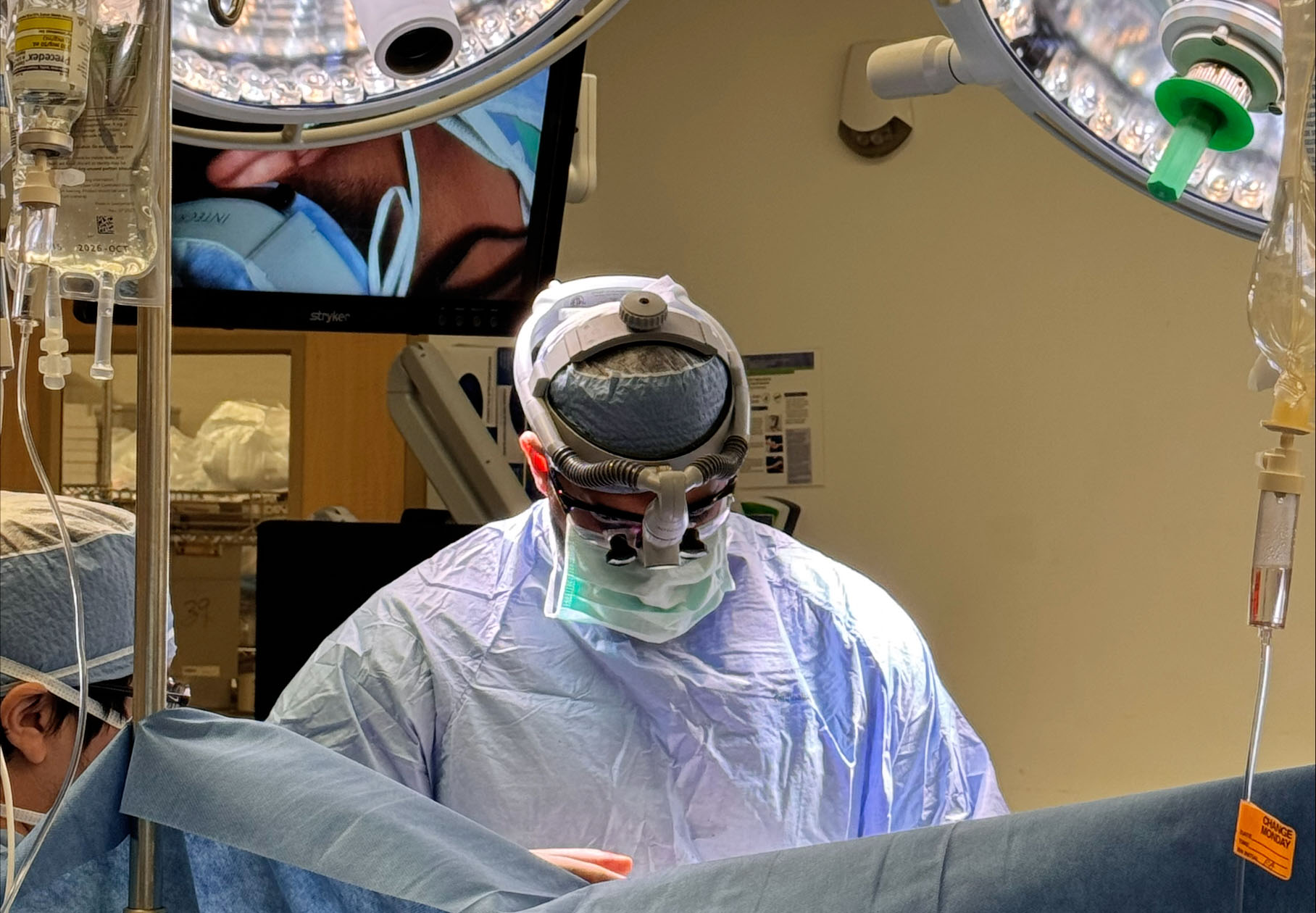Dr. Jessey Chugh performing surgery