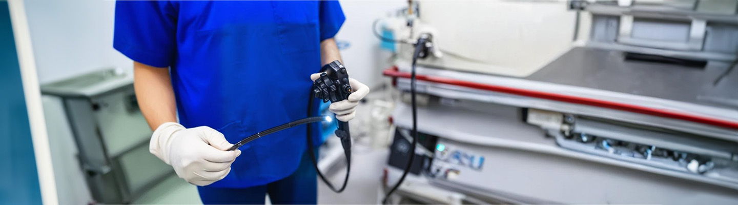 Endoscopy at the hospital Doctor holding endoscope before gastroscopy medical examination