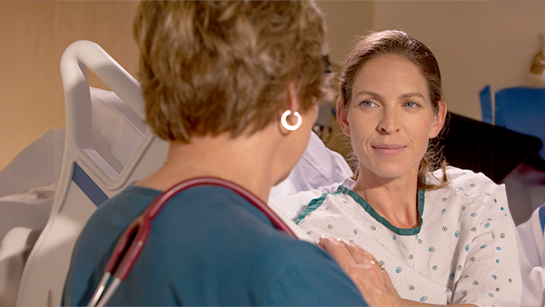 Nurse talking with patient