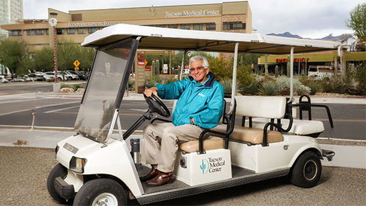 Senior man as volunteering in courtesy car