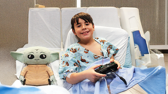 Hospitalized child gaming to benefit Extra Life