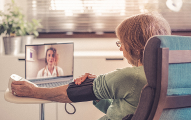 A patient viewing videos and slideshows